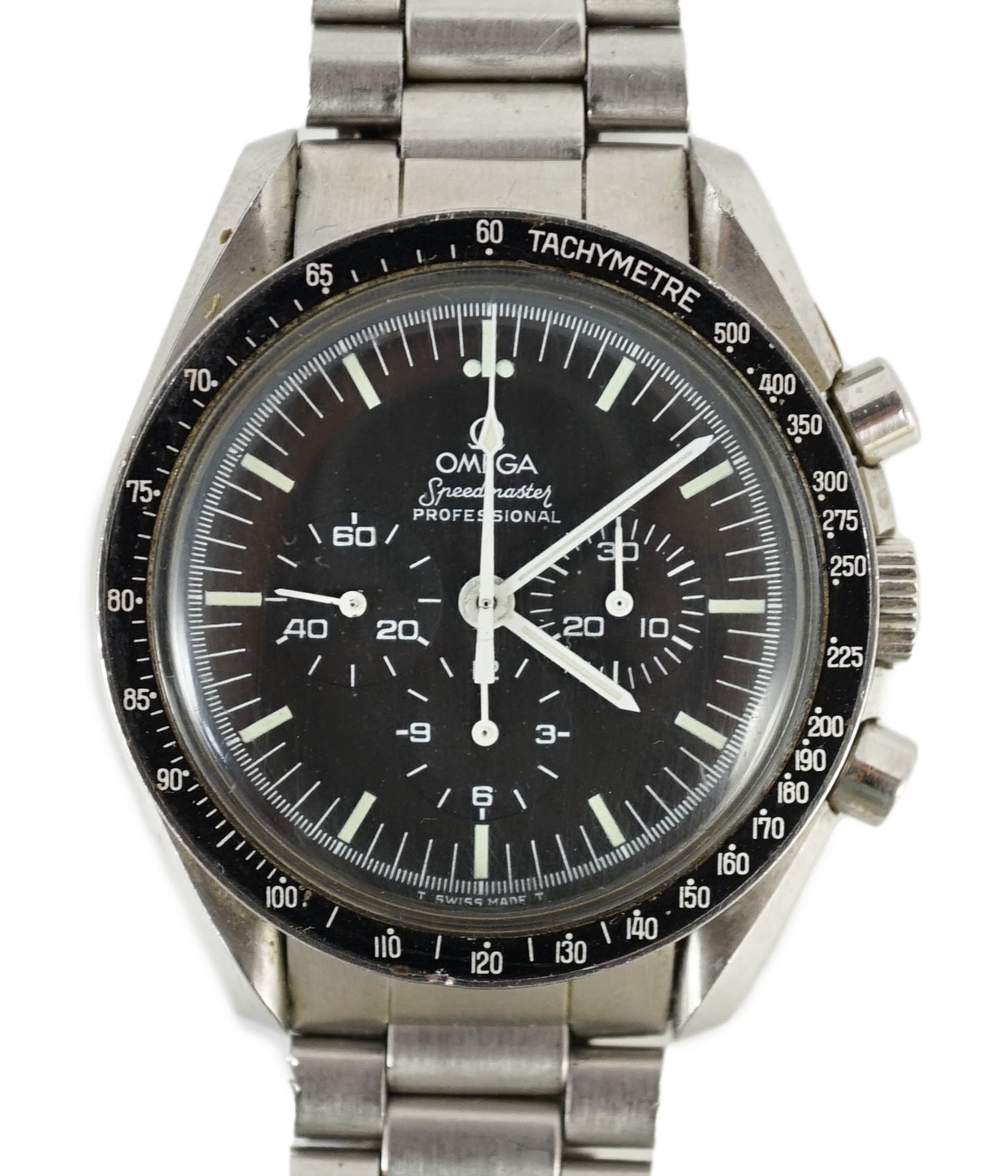 A gentleman's early 1980's stainless steel Omega Speedmaster Professional 'The First Watch Worn On The Moon' manual wind wrist watch, on stainless steel Omega bracelet